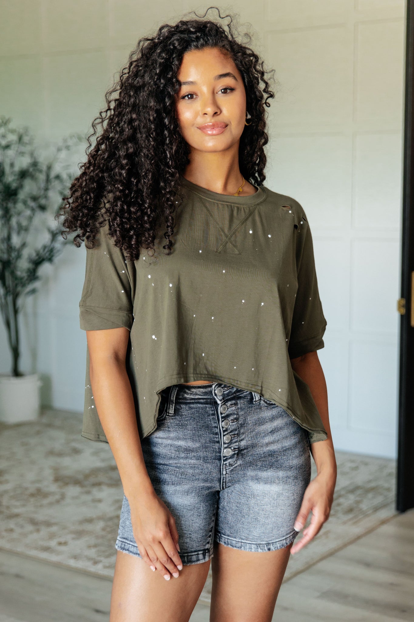 Less Than Stressed Asymmetrical Distressed Top